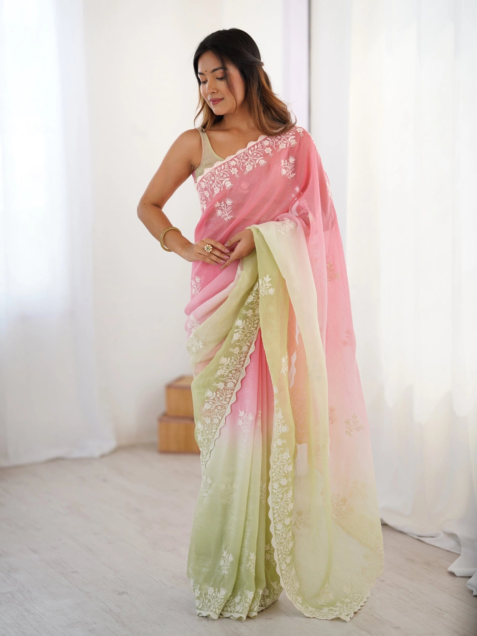 embroidered chiffon scalloped saree in a pink and light green